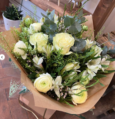 Thinking of You - An arrangement of premium white roses and seasonal white flowers. Filled with different types of foliage to bring texture and interest to the bouquet. Perfect as a sympathy bouquet or for someone who loves a minimalist, monochromatic look.



All bouquets come wrapped in kraft paper, with a water bag made of compostable plastic, and in a brown bag / box.



Please note: We always strive to include the freshest, most vibrant seasonal blooms, so on occasion, subject to availability, it may be necessary to substitute similar blooms to an equal or greater value to maintain our standards of excellence.